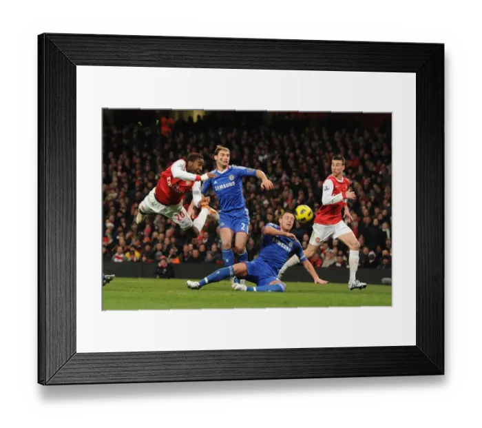 Framed Print : Johan Djourou (Arsenal) John Terry (Chelsea). Arsenal 3: 1 Chelsea. Barclays Premier League Framed Print : Johan Djourou (Arsenal) John Terry (Chelsea). Arsenal 3: 1 Chelsea. Barclays Premier League
