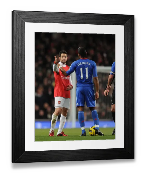 Framed Print : Cesc Fabregas (Arsenal) Didier Drogba (Chelsea). Arsenal 3: 1 Chelsea. Barclays Premier League
