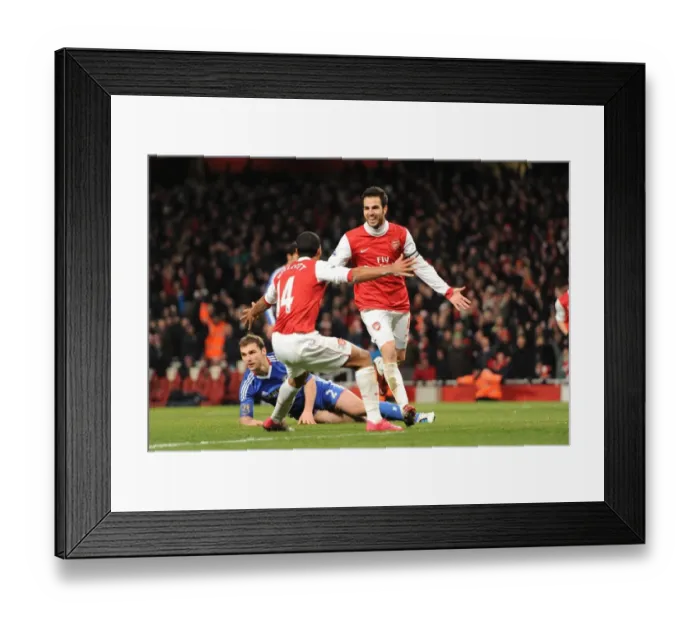 Framed Print : Cesc Fabregas and Theo Walcott: Arsenal's Unstoppable Duo Celebrate 2-1 Over Chelsea Framed Print : Cesc Fabregas and Theo Walcott: Arsenal's Unstoppable Duo Celebrate 2-1 Over Chelsea