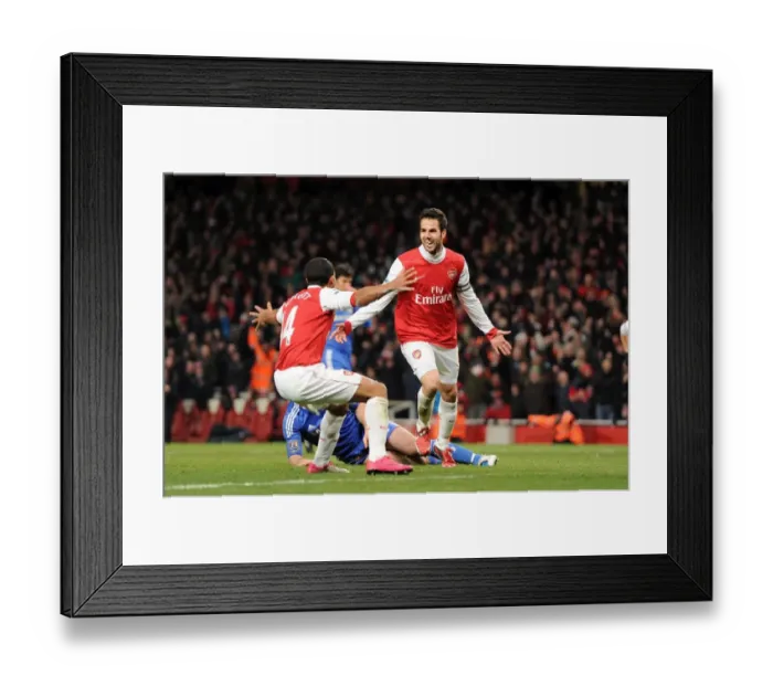 Framed Print : Cesc Fabregas and Theo Walcott Celebrate Arsenal's 2-1 Lead Over Chelsea in the Premier League