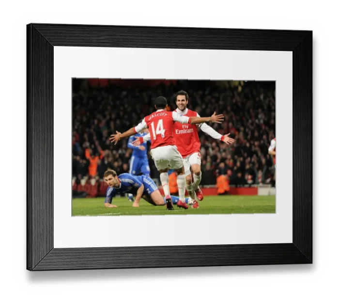 Framed Print : Glory Days: Fabregas and Walcott's Unforgettable Celebration after Arsenal's 3:1 Victory over Chelsea