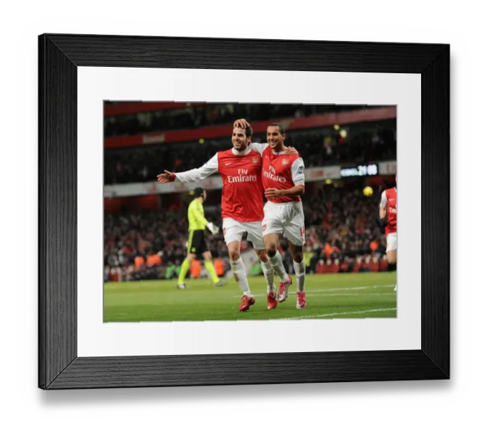 Framed Print : Unforgettable Victory: Fabregas and Walcott's Goal Celebration as Arsenal Triumphs over Chelsea 2-1 in the Premier League Framed Print : Unforgettable Victory: Fabregas and Walcott's Goal Celebration as Arsenal Triumphs over Chelsea 2-1 in the Premier League