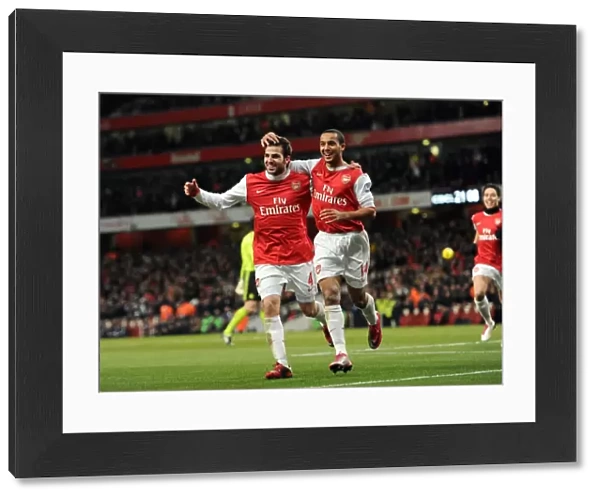 Cesc Fabregas celebrates scoring Arsenals 2nd goal with Theo Walcott