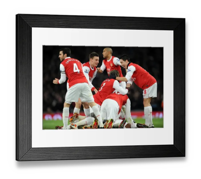 Framed Print : Alex Song's Thrilling Goal: Arsenal's 3-1 Victory Over Chelsea in the Premier League