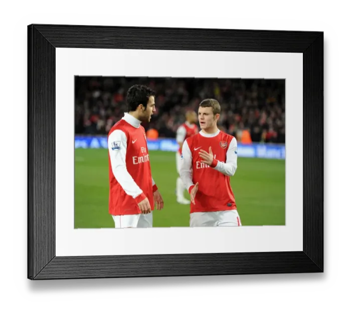 Framed Print : Arsenal's Fabregas and Wilshere Shine: 3-1 Victory Over Chelsea in Premier League