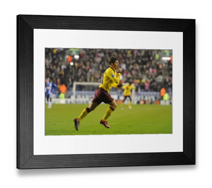 Framed Print : Andrey Arshavin celebrates scoring the 1st Arsenal goal. Wigan Athletic 2: 2 Arsenal Framed Print : Andrey Arshavin celebrates scoring the 1st Arsenal goal. Wigan Athletic 2: 2 Arsenal
