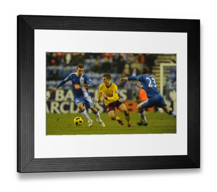 Framed Print : Jack Wilshere (Arsenal) Ronnie Stam and James McArthur (Wigan). Wigan Athletic 2 Framed Print : Jack Wilshere (Arsenal) Ronnie Stam and James McArthur (Wigan). Wigan Athletic 2