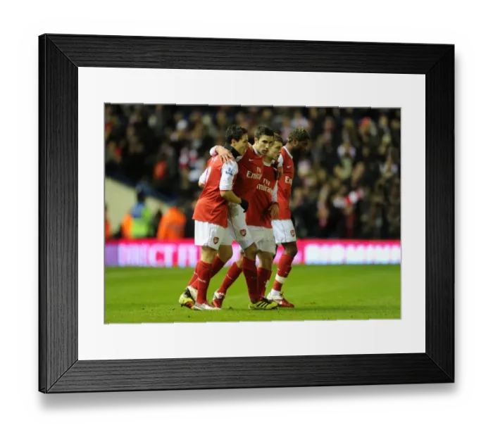Framed Print : Robin van Persie's Stunner: Nasri and Wilshere Join in Arsenal's Triumphant 1-0 Celebration vs. Birmingham (Barclays Premier League, St. Andrews, 1 / 1 / 11)
