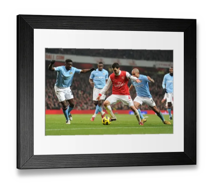 Framed Print : Cesc Fabregas (Arsenal) Kolo Toure and Nigel De Jong (Man City). Arsenal 0