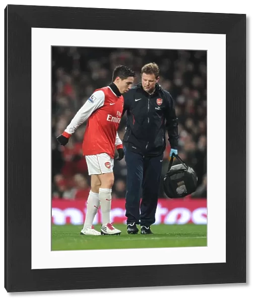 Arsenal physio Colin Lewin treats Samir Nasri. Arsenal 0: 0 Manchester City