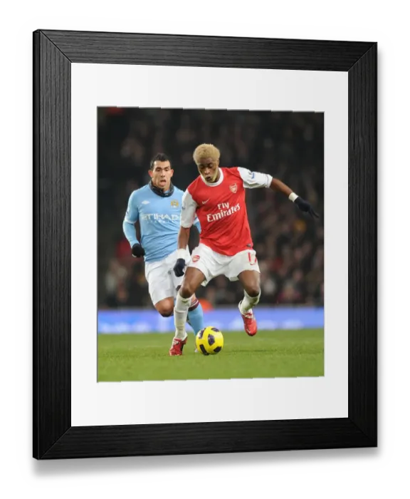 Framed Print : Alex Song (Arsenal) Carlos Tevez (Man City). Arsenal 0: 0 Manchester City Framed Print : Alex Song (Arsenal) Carlos Tevez (Man City). Arsenal 0: 0 Manchester City