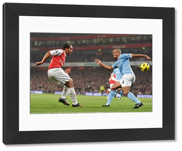 Theo Walcott (Arsenal) Vincent Kompany (Man City). Arsenal 0: 0 Manchester City