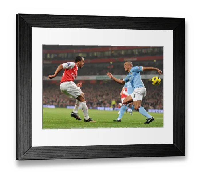 Framed Print : Theo Walcott (Arsenal) Vincent Kompany (Man City). Arsenal 0: 0 Manchester City