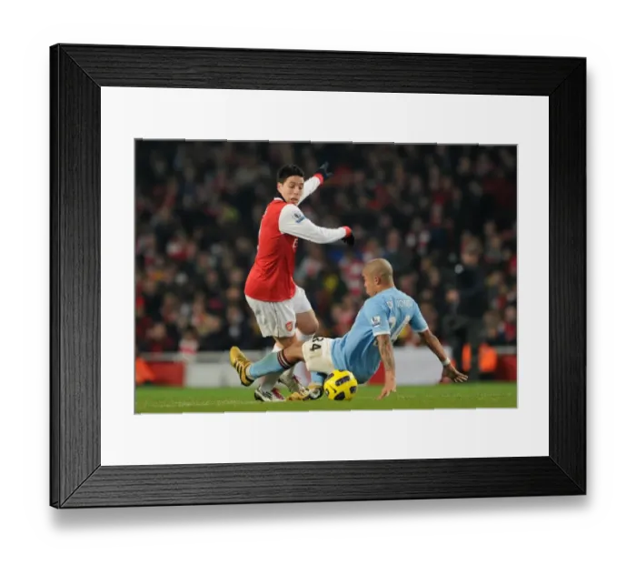 Framed Print : Samir Nasri (Arsenal) Nigel De Jong (Man City). Arsenal 0: 0 Manchester City