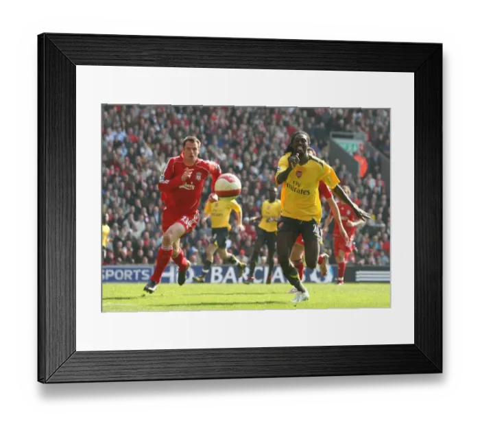 Framed Print : Clash of Titans: Adebayor vs. Carragher - Liverpool's Triumph over Arsenal (4-1) Framed Print : Clash of Titans: Adebayor vs. Carragher - Liverpool's Triumph over Arsenal (4-1)