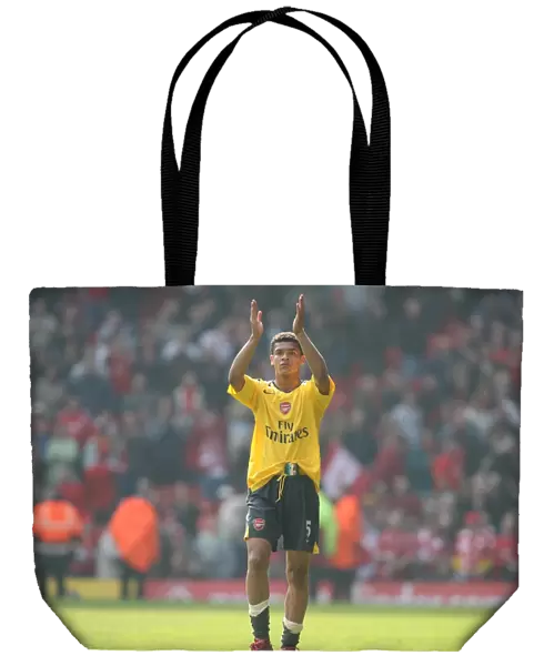 Denilson waves to the Arsenal fans after the match