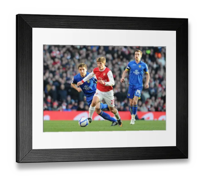 Framed Print : Andrey Arshavin (Arsenal) Alex Bruce (Leeds). Arsenal 1: 1 Leeds United