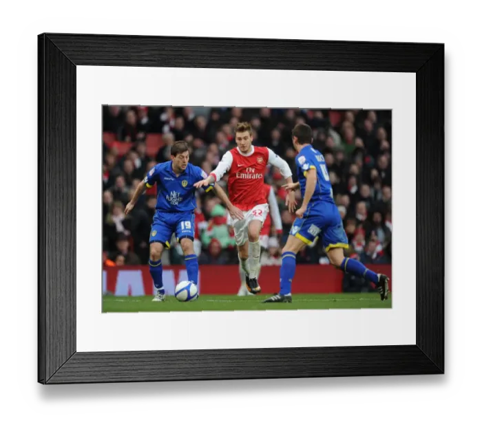 Framed Print : Nicklas Bendtner (Arsenal) Ben Parker (Leeds). Arsenal 1: 1 Leeds United Framed Print : Nicklas Bendtner (Arsenal) Ben Parker (Leeds). Arsenal 1: 1 Leeds United
