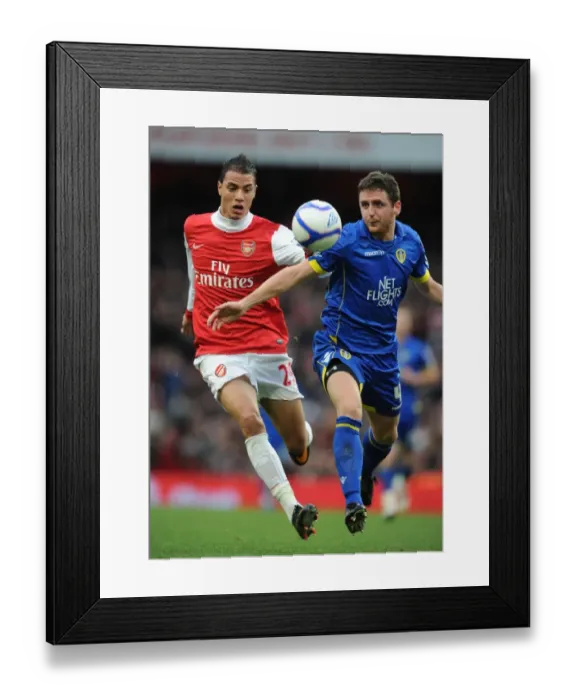 Framed Print : Chamakh vs Bruce: FA Cup 2011 - Arsenal vs Leeds United 1-1 Stalemate