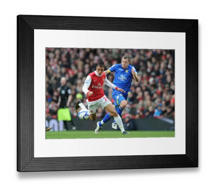 Framed Print : Marouane Chamakh (Arsenal) Paul Connolly (Leeds). Arsenal 1: 1 Leeds United