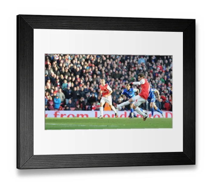 Framed Print : Cesc Fabregas shoots past Leeds goalkeeper Kasper Schmeichel to score the Arsenal goal Framed Print : Cesc Fabregas shoots past Leeds goalkeeper Kasper Schmeichel to score the Arsenal goal
