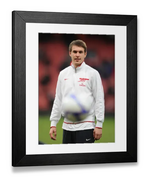 Framed Print : Arsenal's Aaron Ramsey in FA Cup Action vs Leeds United at Emirates Stadium Framed Print : Arsenal's Aaron Ramsey in FA Cup Action vs Leeds United at Emirates Stadium