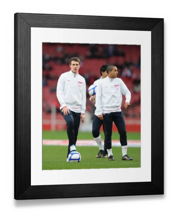 Framed Print : Arsenal Stars Aaron Ramsey and Theo Walcott Tie FA Cup 3rd Round Against Leeds United Framed Print : Arsenal Stars Aaron Ramsey and Theo Walcott Tie FA Cup 3rd Round Against Leeds United