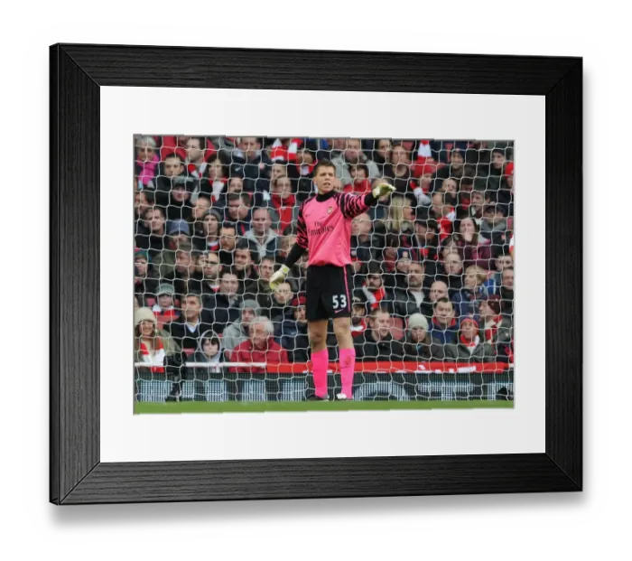 Framed Print : Arsenal's Wojcjech Szczesny in FA Cup Clash Against Leeds United at Emirates Stadium
