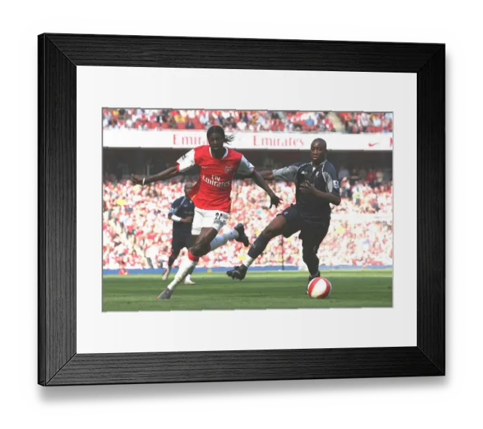 Framed Print : Adebayor vs. Meite: Arsenal's Narrow Victory Over Bolton Wanderers, FA Premiership, 14 / 4 / 2007