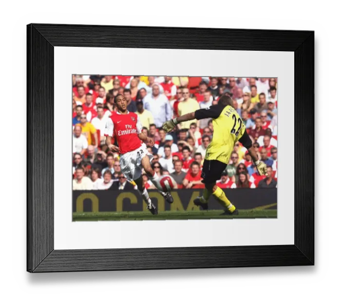 Framed Print : Gael Clichy (Arsenal) Jussi Jskelainen (Bolton) Framed Print : Gael Clichy (Arsenal) Jussi Jskelainen (Bolton)