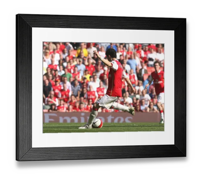 Framed Print : Cesc Fabregas shoots past Bolton goalkeeper Jussi Jskelainen to score the 2nd Arsenal goal