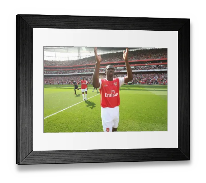 Framed Print : Kolo Toure applauds the fans before the match