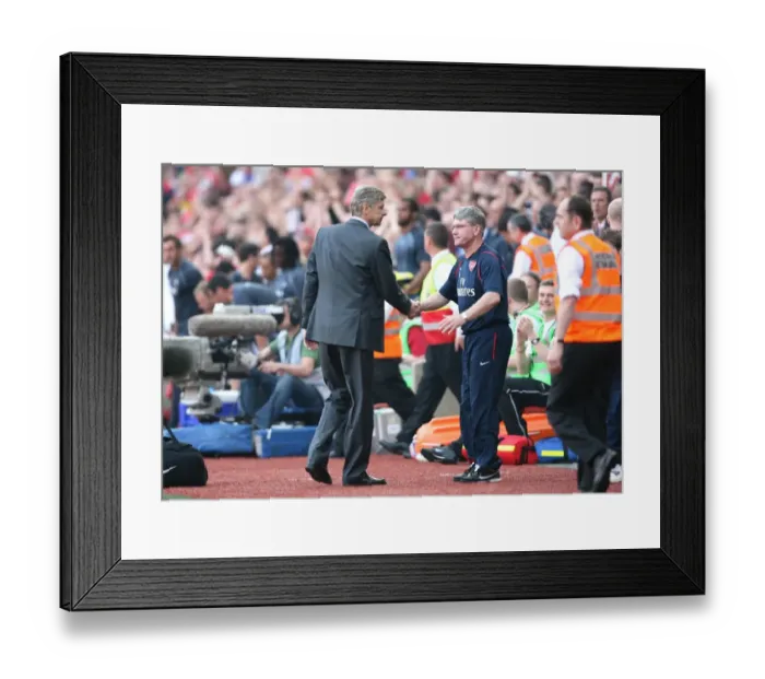 Framed Print : Arsenal manager Arsene Wenger and assistant Pat Rice shake hands after the match