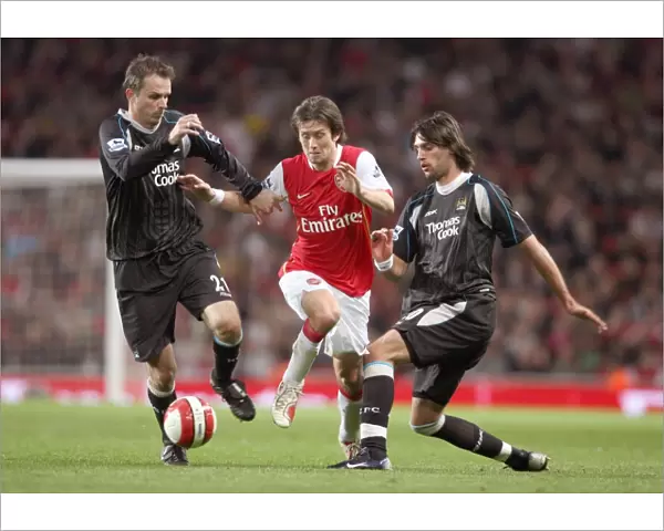 Tomas Rosicky (Arsenal) Dietmar Hamann and Georgios Samaraz (Man City)