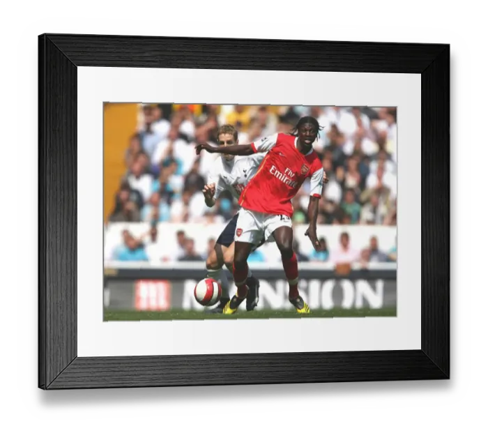Framed Print : Clash of Rivals: Adebayor vs. Dawson in the Intense 2006-07 FA Premiership Rivalry Match Between Tottenham and Arsenal Framed Print : Clash of Rivals: Adebayor vs. Dawson in the Intense 2006-07 FA Premiership Rivalry Match Between Tottenham and Arsenal