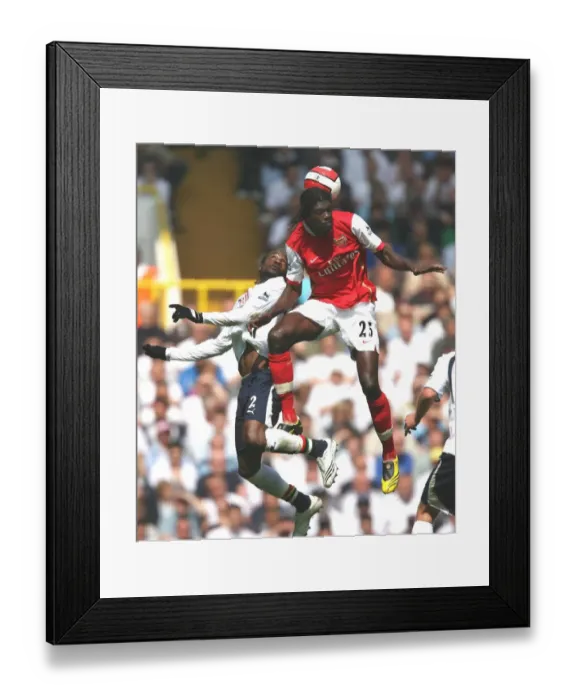 Framed Print : Emmanuel Adebayor (Arsenal) Didier Zokora (Tottenham)