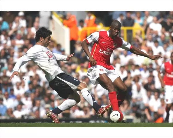 Clash of Rivals: Abu Diaby vs. Ricardo Rocha - The Intense Rivalry between Arsenal's Diaby and Tottenham's Rocha during the 2006-07 FA Premiership Match at White Hart Lane