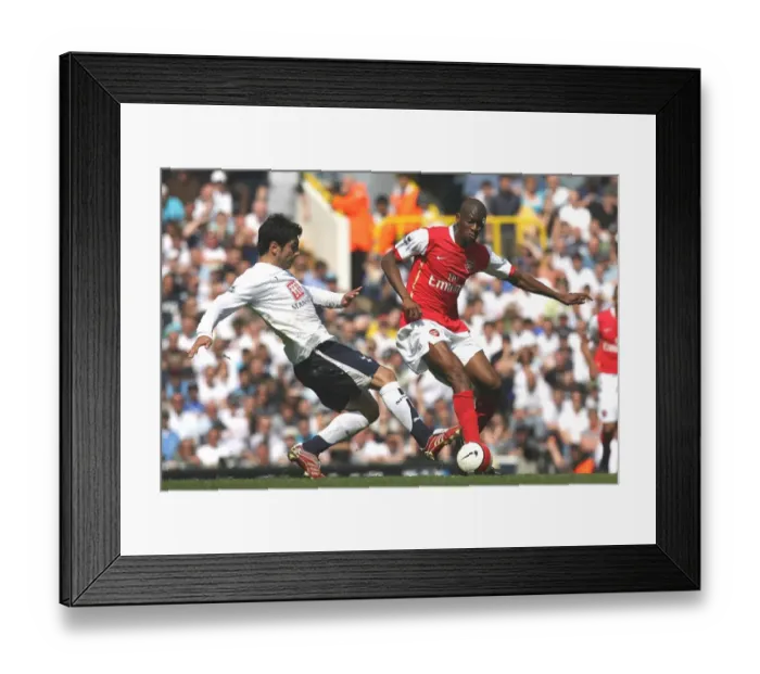 Framed Print : Clash of Rivals: Abu Diaby vs. Ricardo Rocha - The Intense Rivalry between Arsenal's Diaby and Tottenham's Rocha during the 2006-07 FA Premiership Match at White Hart Lane