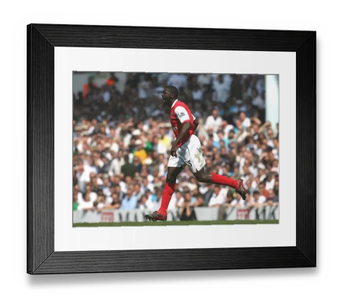 Framed Print : Kolo Toure celebrates scoring the 1st Arsenal goal Framed Print : Kolo Toure celebrates scoring the 1st Arsenal goal