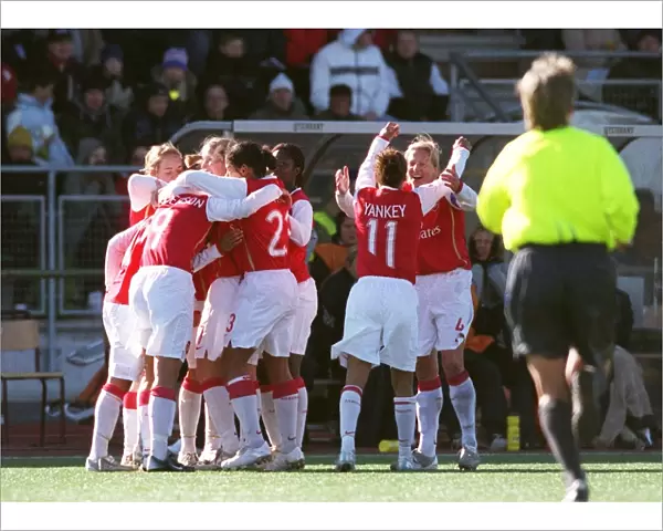 Arsenal ladies celebrate their goal scored by Alex Scott