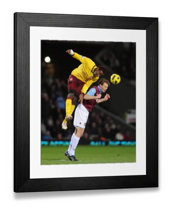 Framed Print : Arsenal's Djourou Overpowers Spector as Arsenal Thrash West Ham 3-0