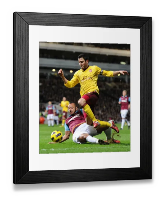 Framed Print : Cesc Fabregas Game-Winning Goal: Arsenal's Triumph Over West Ham (3-0)