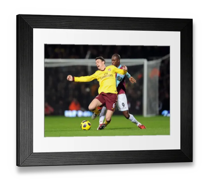 Framed Print : Laurent Koscielny (Arsenal) Carlton Cole (West Ham). West Ham United 0: 3 Arsenal Framed Print : Laurent Koscielny (Arsenal) Carlton Cole (West Ham). West Ham United 0: 3 Arsenal