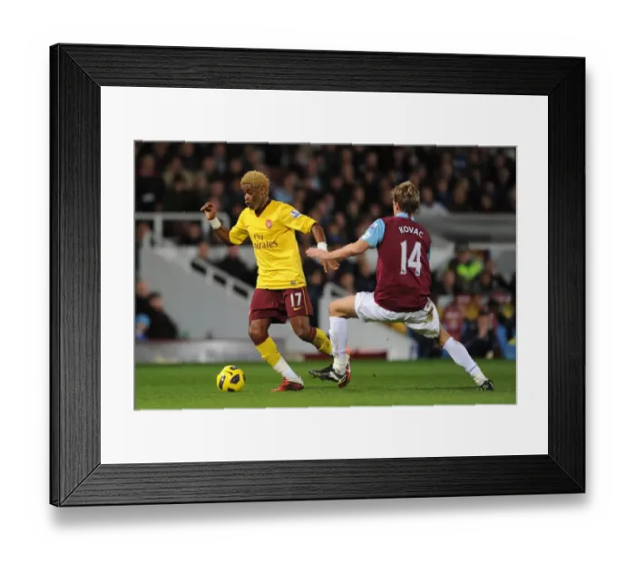 Framed Print : Alex Song (Arsenal) Radoslav Kovac (West Ham). West Ham United 0: 3 Arsenal Framed Print : Alex Song (Arsenal) Radoslav Kovac (West Ham). West Ham United 0: 3 Arsenal
