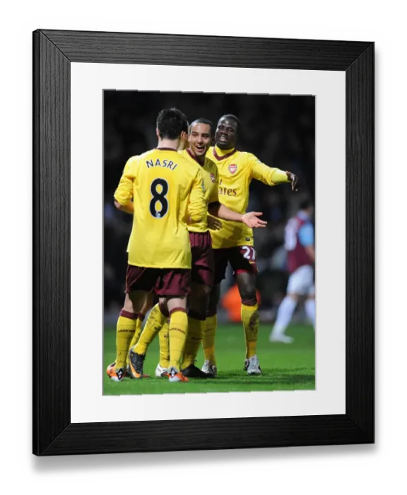 Framed Print : Theo Walcott celebrates scoring the 2nd Arsenal goal with Samir Nasri and Emmauel Eboue