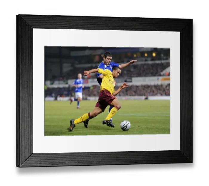 Framed Print : Theo Walcott Scores the Winner: Arsenal Edge Past Ipswich in Carling Cup Semi-Final Framed Print : Theo Walcott Scores the Winner: Arsenal Edge Past Ipswich in Carling Cup Semi-Final