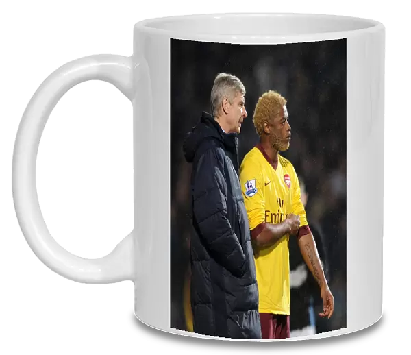 Arsene Wenger the Arsenal Manager with Alex Song. Ipswich Town 1: 0 Arsenal