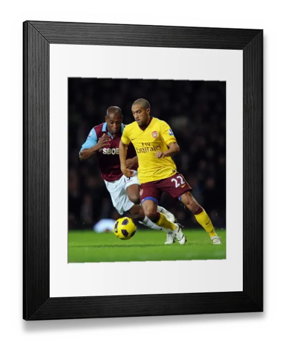 Framed Print : Gael Clichy (Arsenal) Luis Boa Morte (West Ham). West Ham United 0: 3 Arsenal