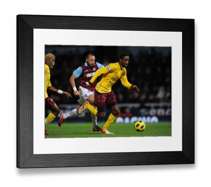 Framed Print : Johan Djourou (Arsenal) Julien Faubert (West Ham). West Ham United 0: 3 Arsenal Framed Print : Johan Djourou (Arsenal) Julien Faubert (West Ham). West Ham United 0: 3 Arsenal