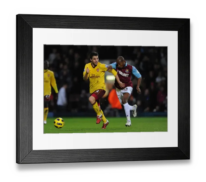 Framed Print : Cesc Fabregas (Arsenal) Luis Boa Morte (West Ham). West Ham United 0: 3 Arsenal Framed Print : Cesc Fabregas (Arsenal) Luis Boa Morte (West Ham). West Ham United 0: 3 Arsenal